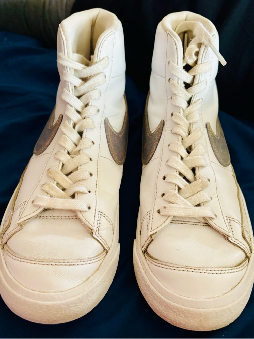 Nike White High-Top Athletic Shoes with Gray Swoosh